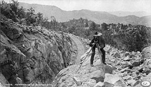 vintage black and white photo of a photographer outside