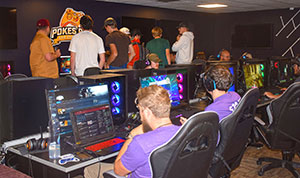 people playing games on computers