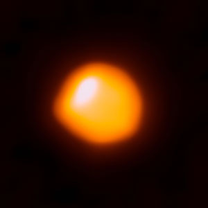 photograph of red-orange star
