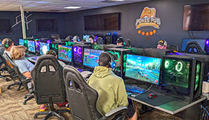 people at a row of computers
