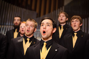 group of men singing