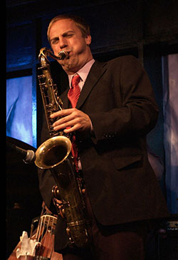 man playing saxophone