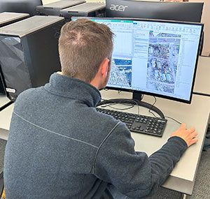 man working at a computer