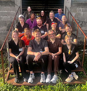 group of people sitting on steps