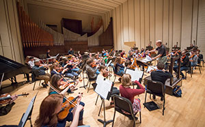 orchestra rehearsing