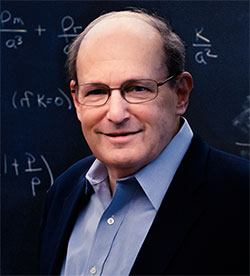 man standing in front of a chalkboard