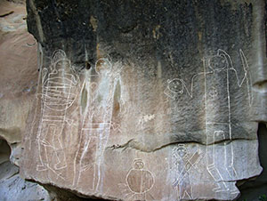 petroglyphs with figures of people