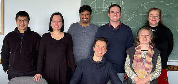 group of people posing for the photo