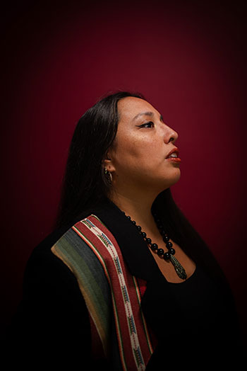 woman against a red background