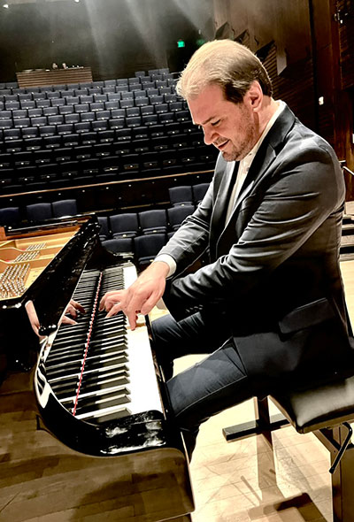 man playing a piano