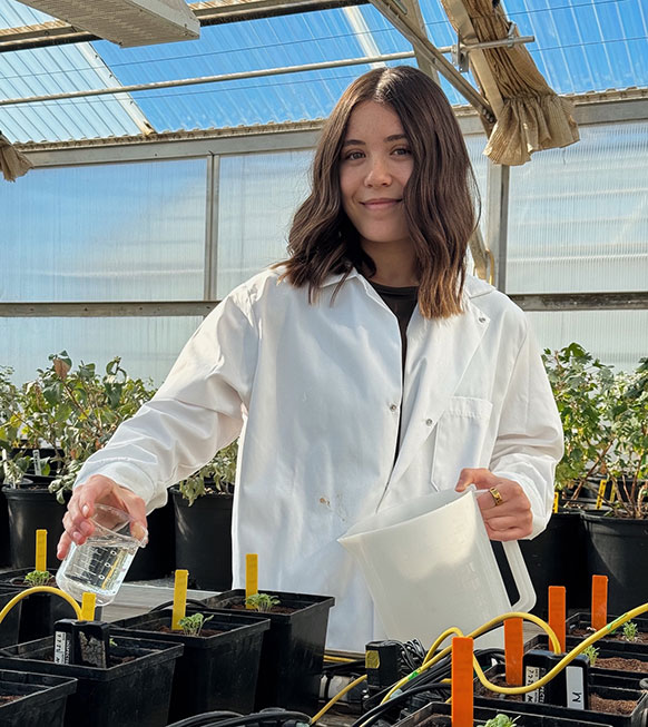 woman working in greenhouse