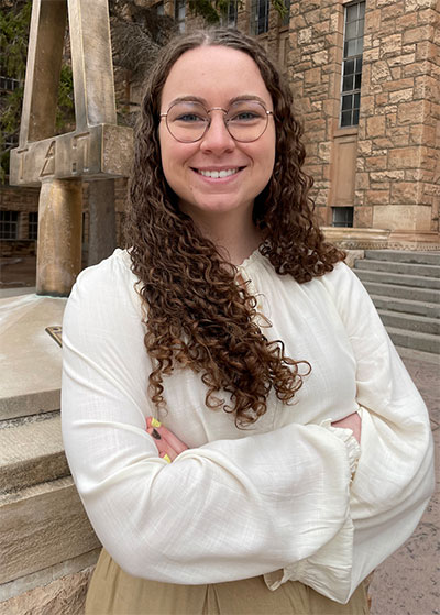 woman standing with arms crossed