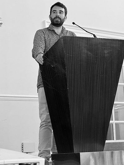 man standing at a podium