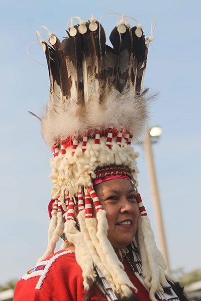 woman in Native American regalia