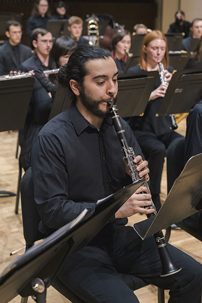 man playing a clarinet