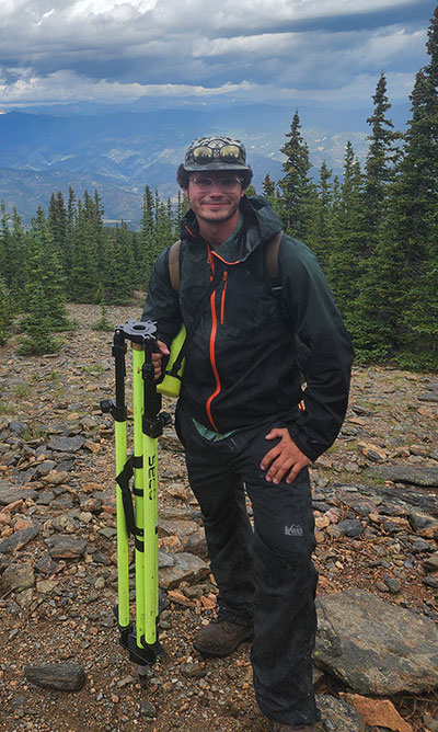 man standing outdoors in the mountains