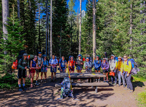 group of people in the woods