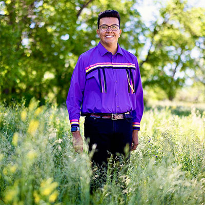 man standing in a field