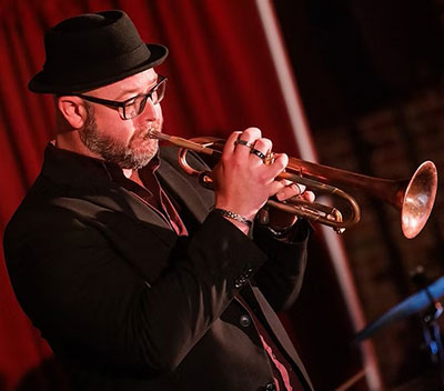 man playing a trumpet