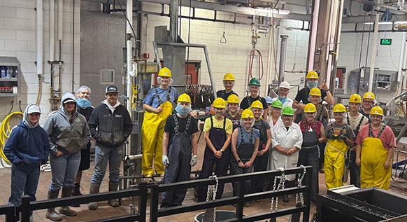 group of people wearing hard hats