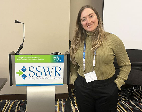 woman standing by a podium