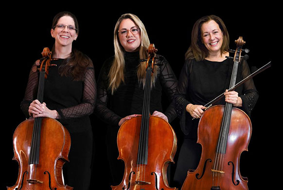 three women holding cellos