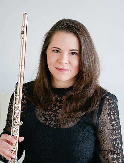 woman holding a flute