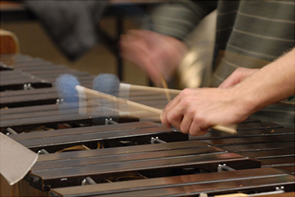 person playing marimba