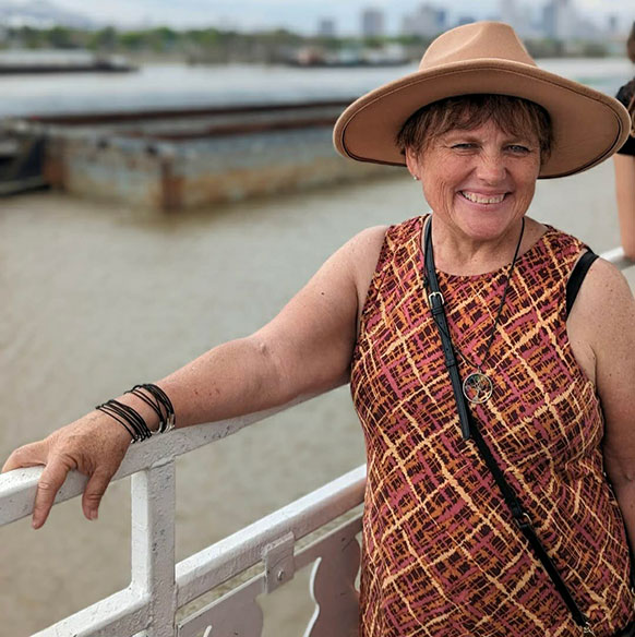 woman leaning on a railing