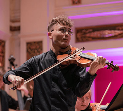man playing a violin