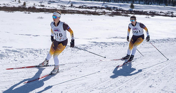 two people Nordic skiing