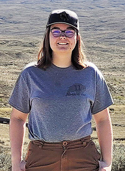 Woman standing outside.