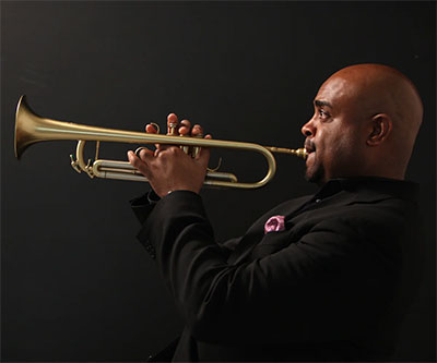 man playing a trumpet