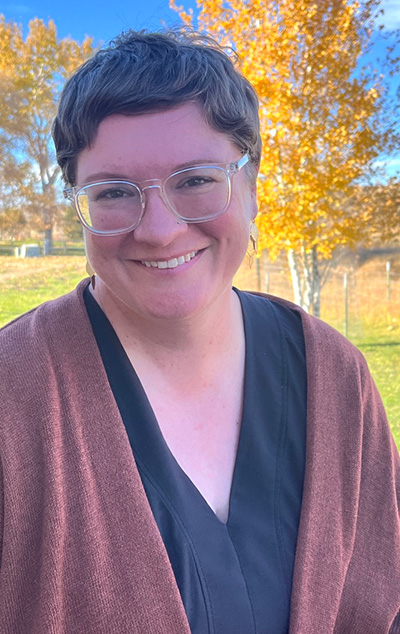 A woman smiles