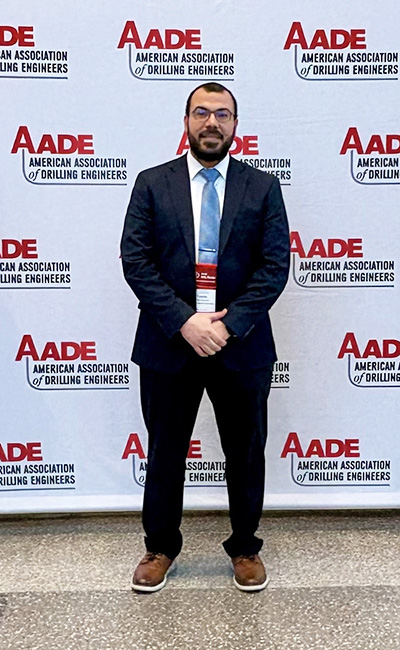 A man stands in a suit