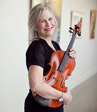 woman holding a viola