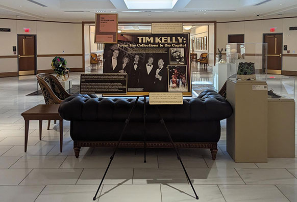 Exhibit set up around a black photo