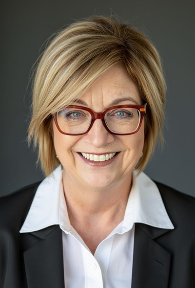 A University of Wyoming distinguished alumna smiles.