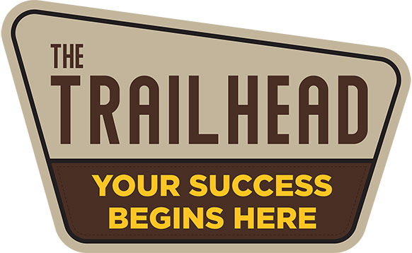 sign graphic saying The Trailhead Your Success Begins Here