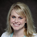 woman with blonde hair and smile