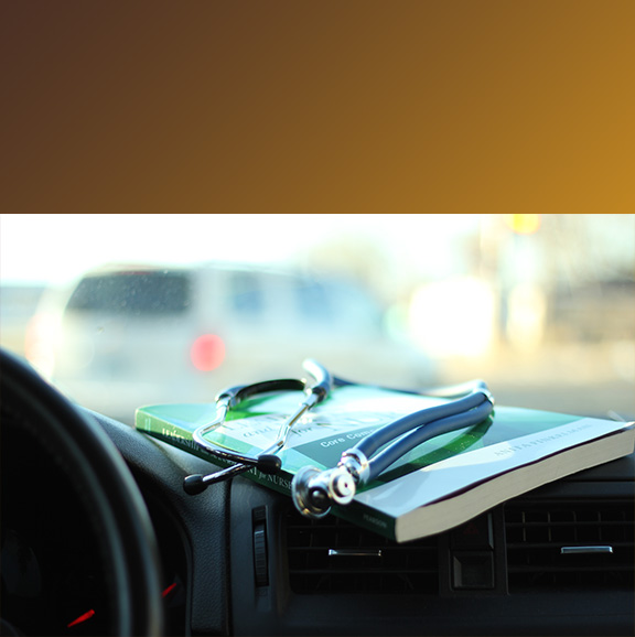 Car with nursing textbook and stethoscope 