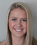 Smiling young woman with long blond hair