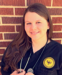 Kaylee Taylor poses outside her capstone location