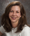 Portrait of woman with full brown hair