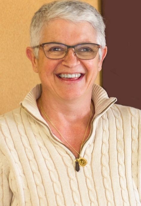 esther gilman in an ivory sweater