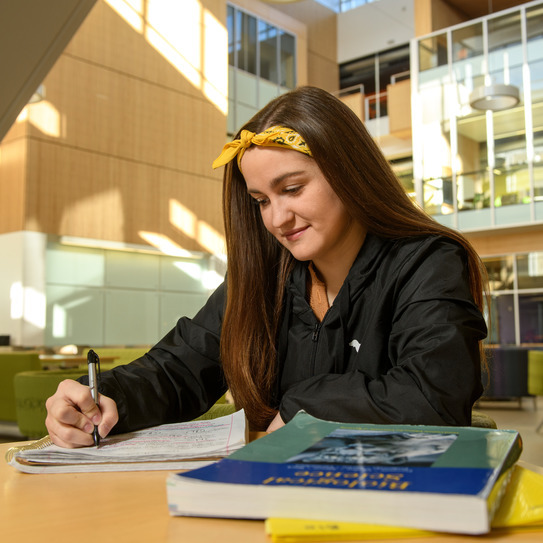UW student studies in the STEM building