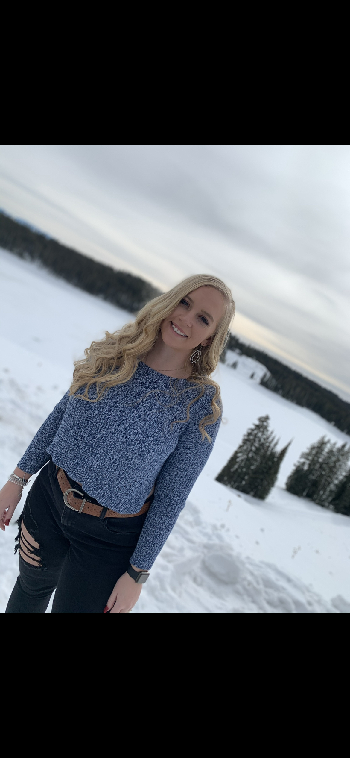 female student standing in snow