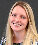 smiling young woman with long straight blonde hair