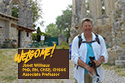 woman tourist standing in front of Spanish ruins