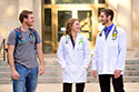 Ethan Atwood (left) BRAND student, visits with students from other UW Nursing Programs